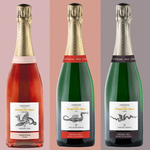 Trois bouteilles de champagne Dragon des Alpes : cuvées Été, Hiver et Printemps côte à côte